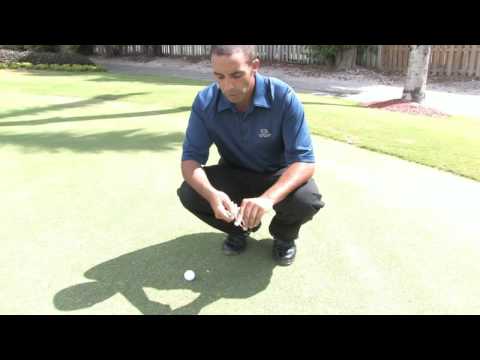 Golf Tips & Etiquette : How to Repair a Golf Ball Divot on the Putting Green