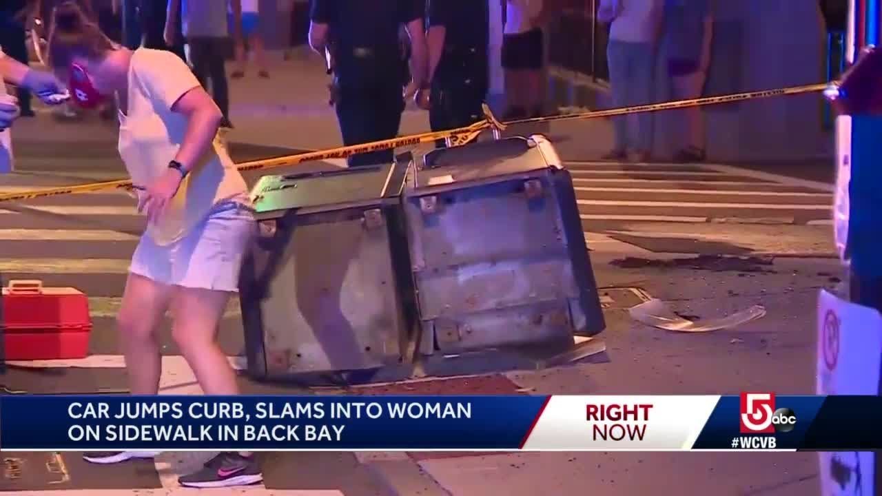 Car jumps curb, slams into woman on sidewalk